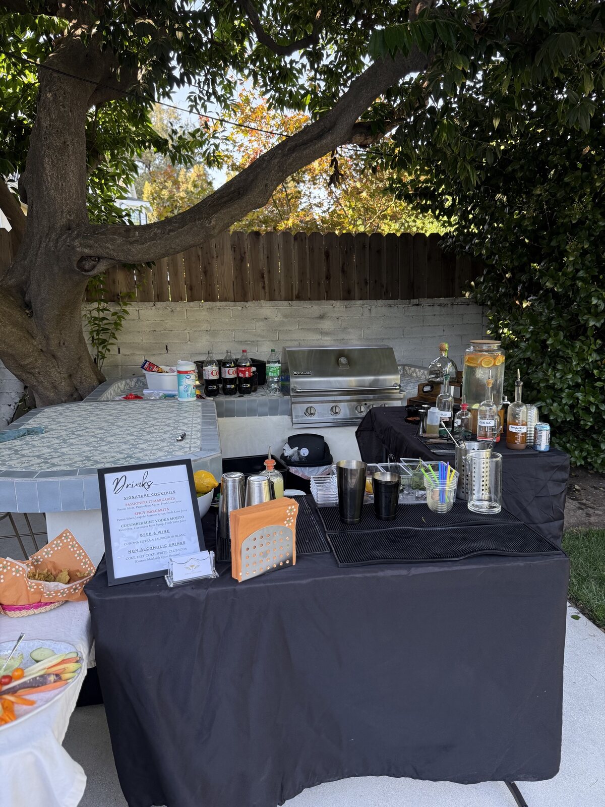 Event bar setup with cocktail menu.